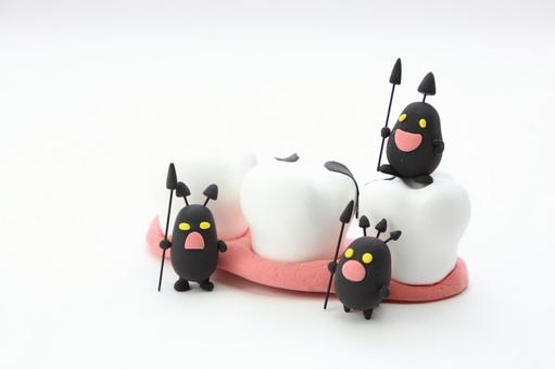 虫歯菌が歯に住み着いているイラスト